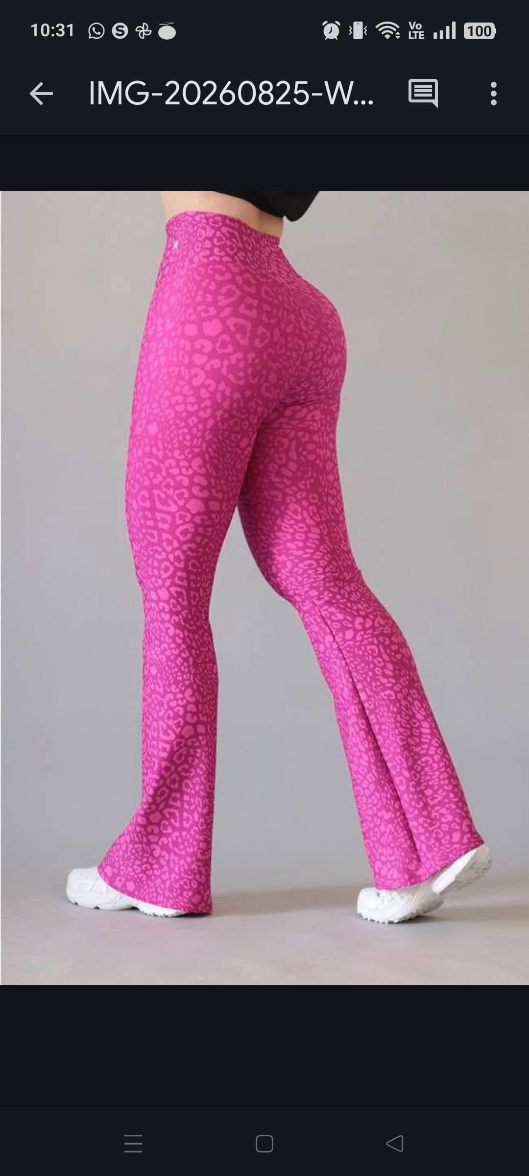 Leggings acampanados rosa fucsia con estampado animal